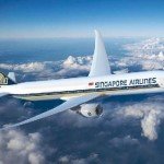 Singapore Airlines Airbus flying in blue sky with clouds